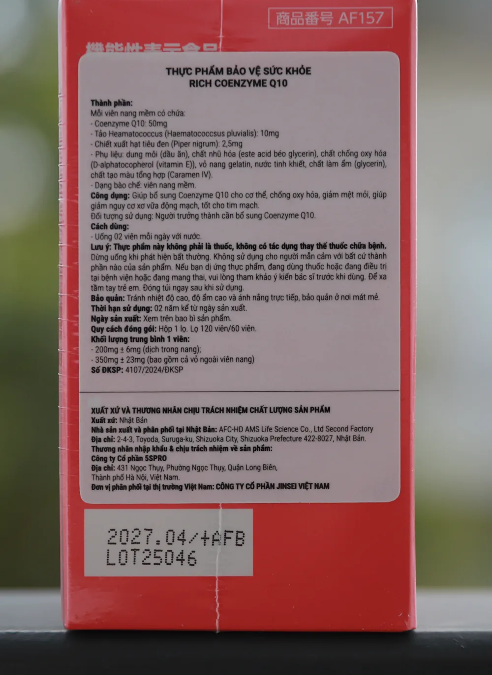 Mặt sau hộp Rich Coenzyme Q10 — tem phụ tiếng Việt, số đăng ký sản phẩm, số lô và hạn dùng in trên vỏ